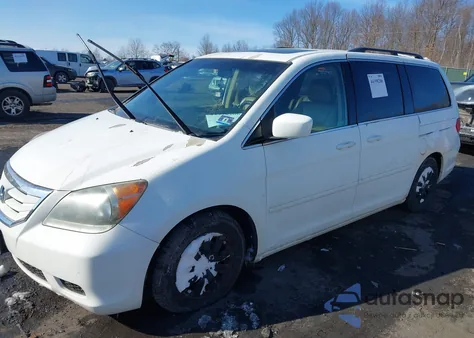 2010 Honda Odyssey Ex-L z USA, uszkodzony, nr VIN 5FNRL3H67AB097550